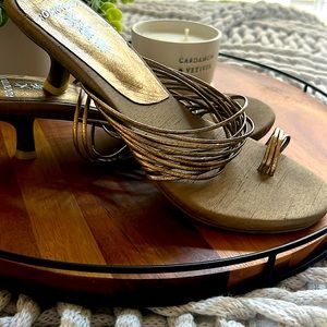 Gold strappy heels